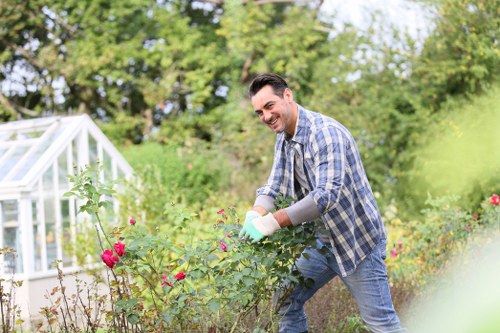 Garden maintenance tools including pruning shears and watering can